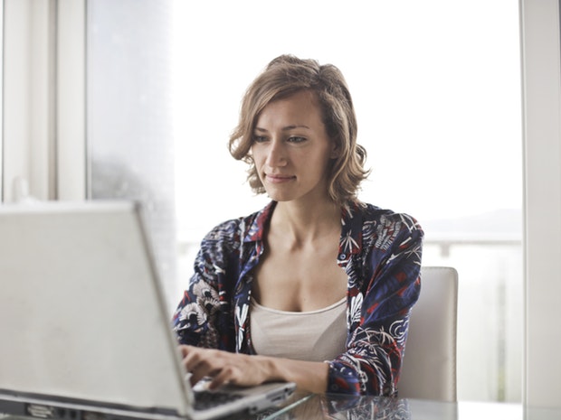 woman using laptop